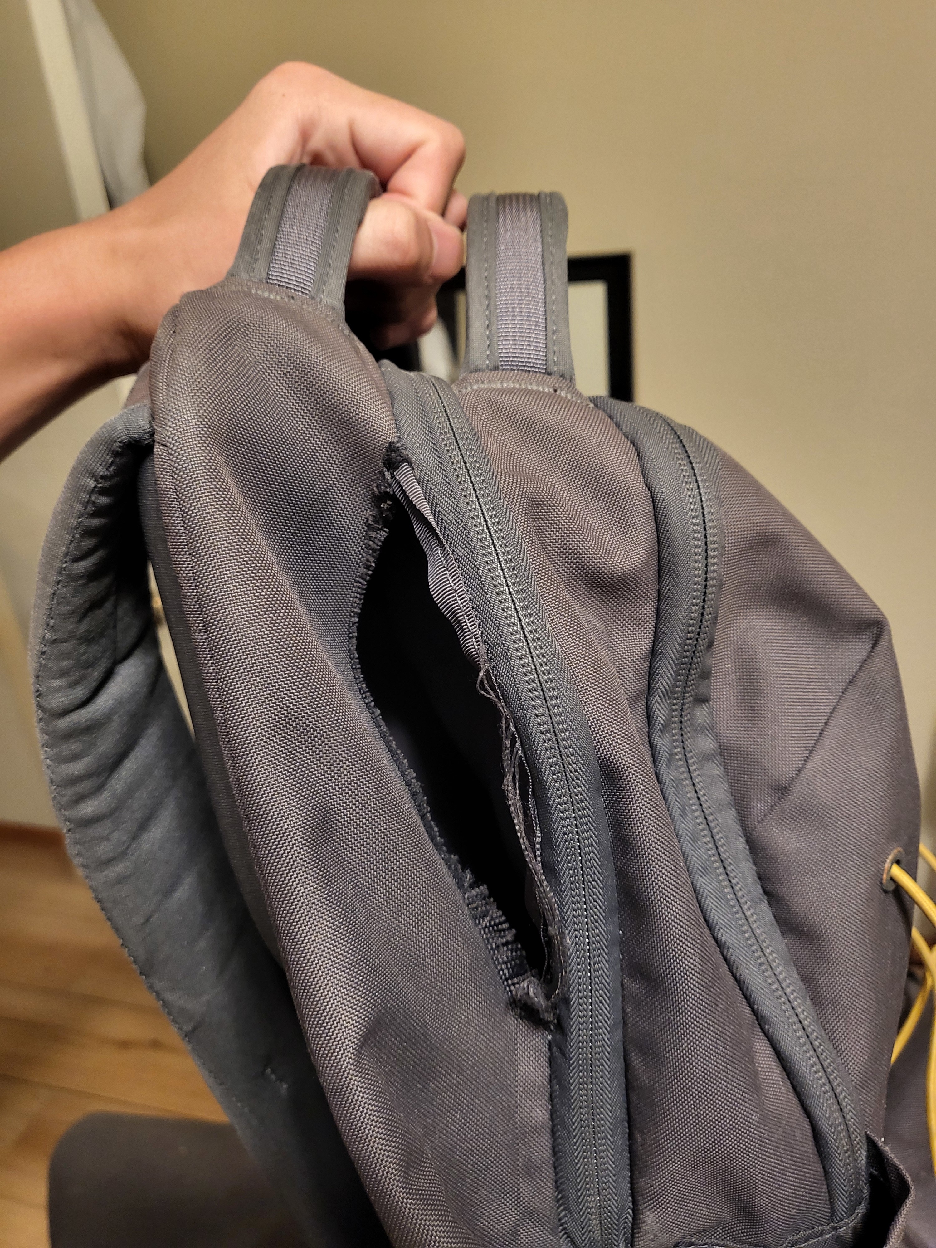Tear in back pack.