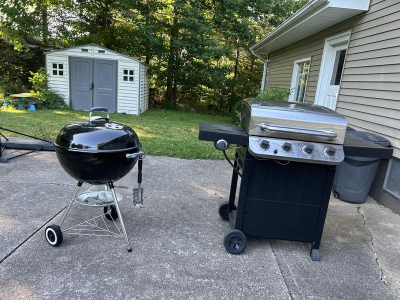 Next to my old propane grill.
