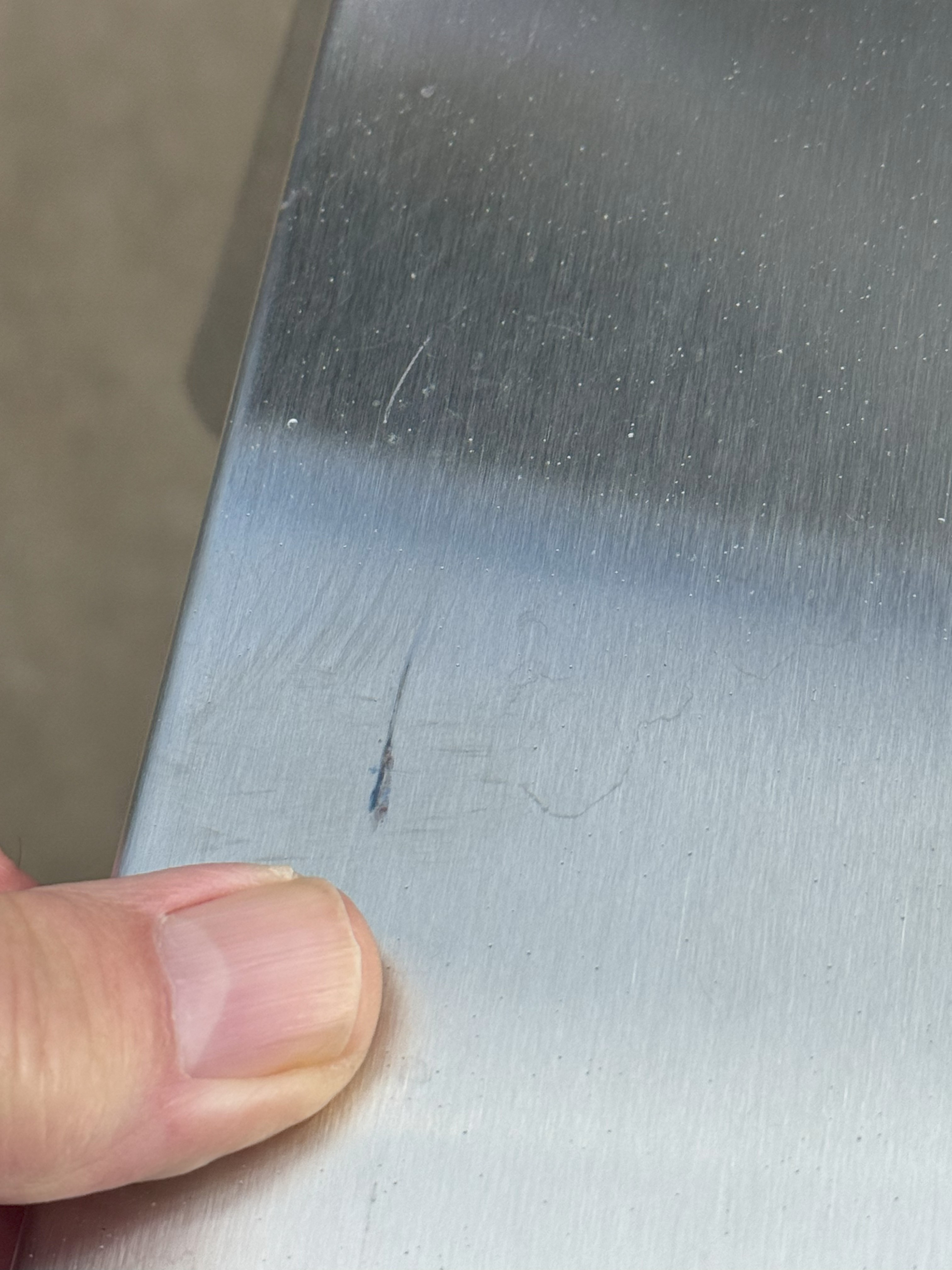 Small gouge in shelf