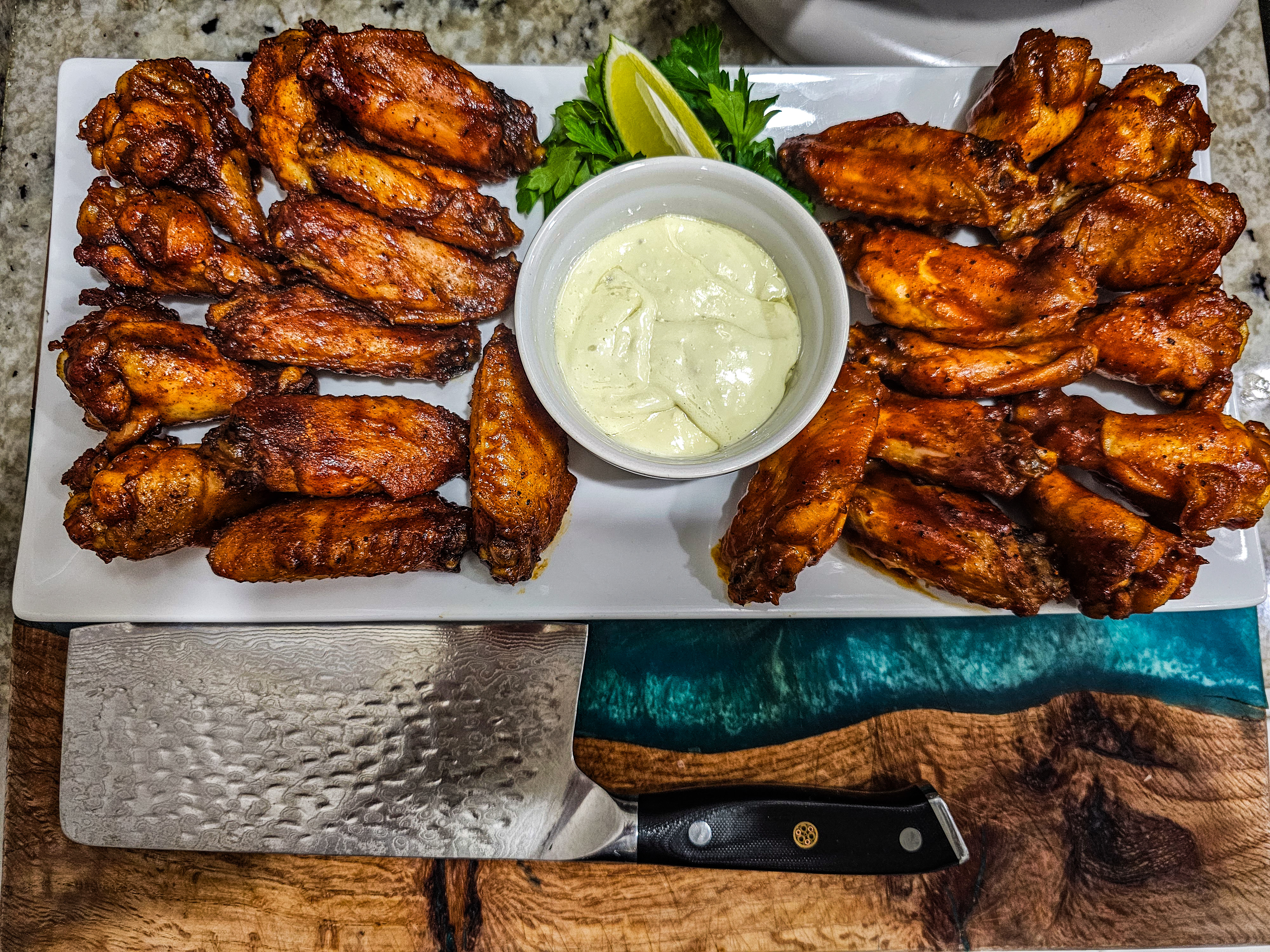 Amazing wings in the rotisserie basket.