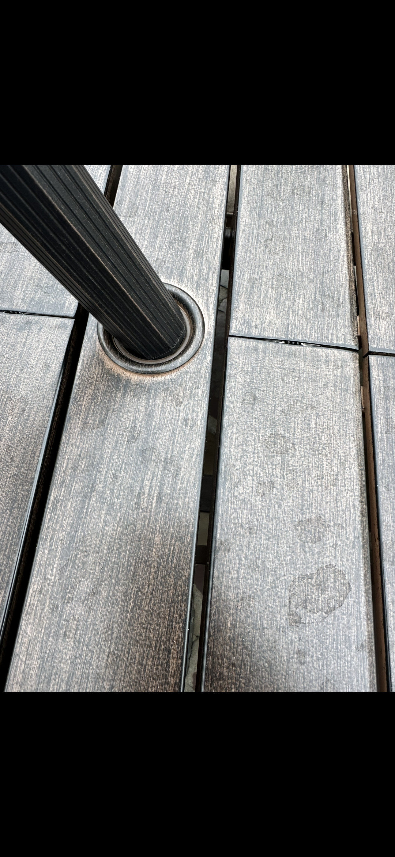 Umbrella does not fit in hole in table