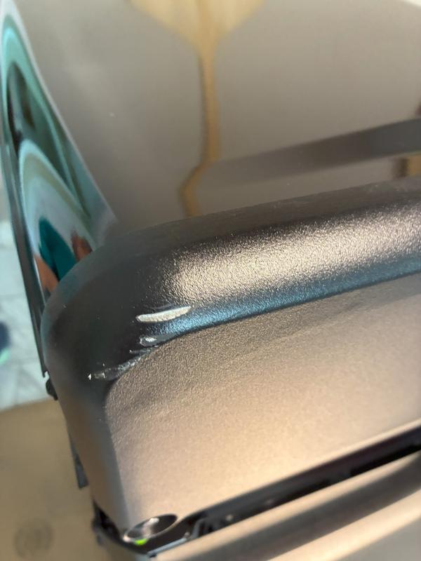 gouge in the side of lid