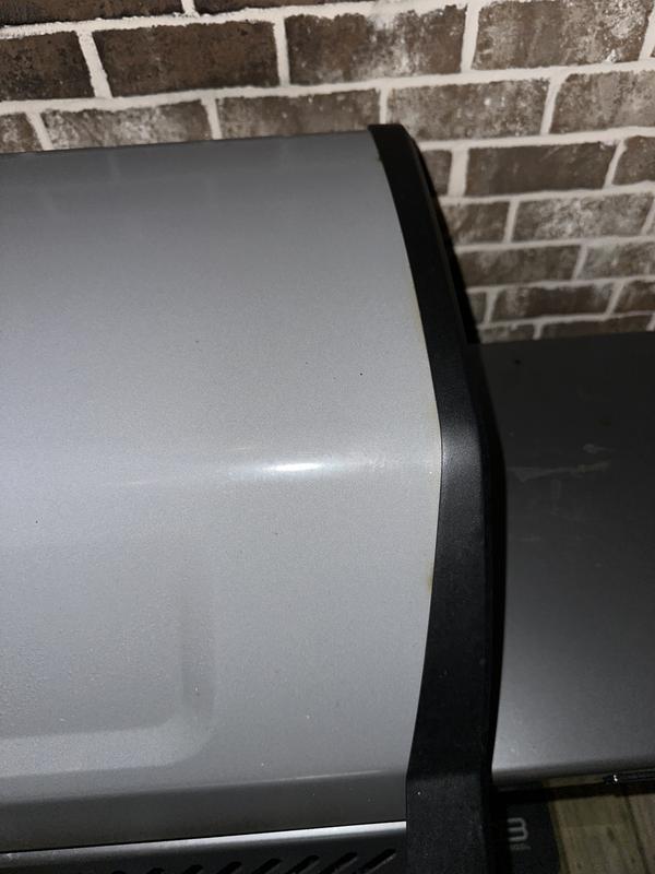 Burn marks on left side of grill after 12 uses.