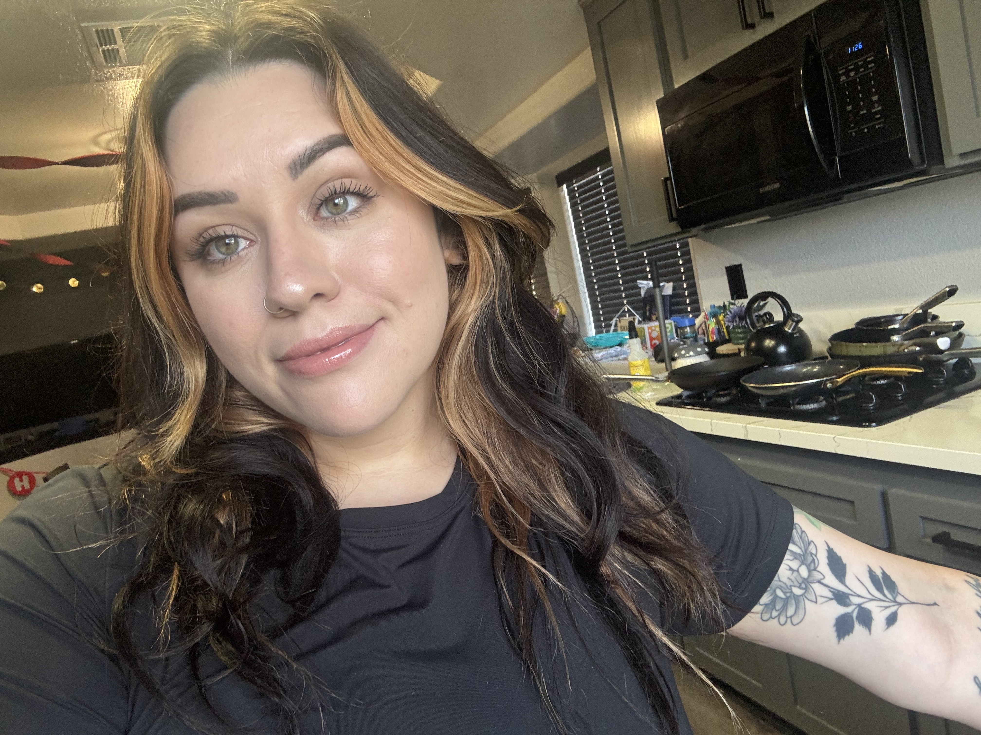 Tinted moisturizer with light under concealer and a translucent setting powder.