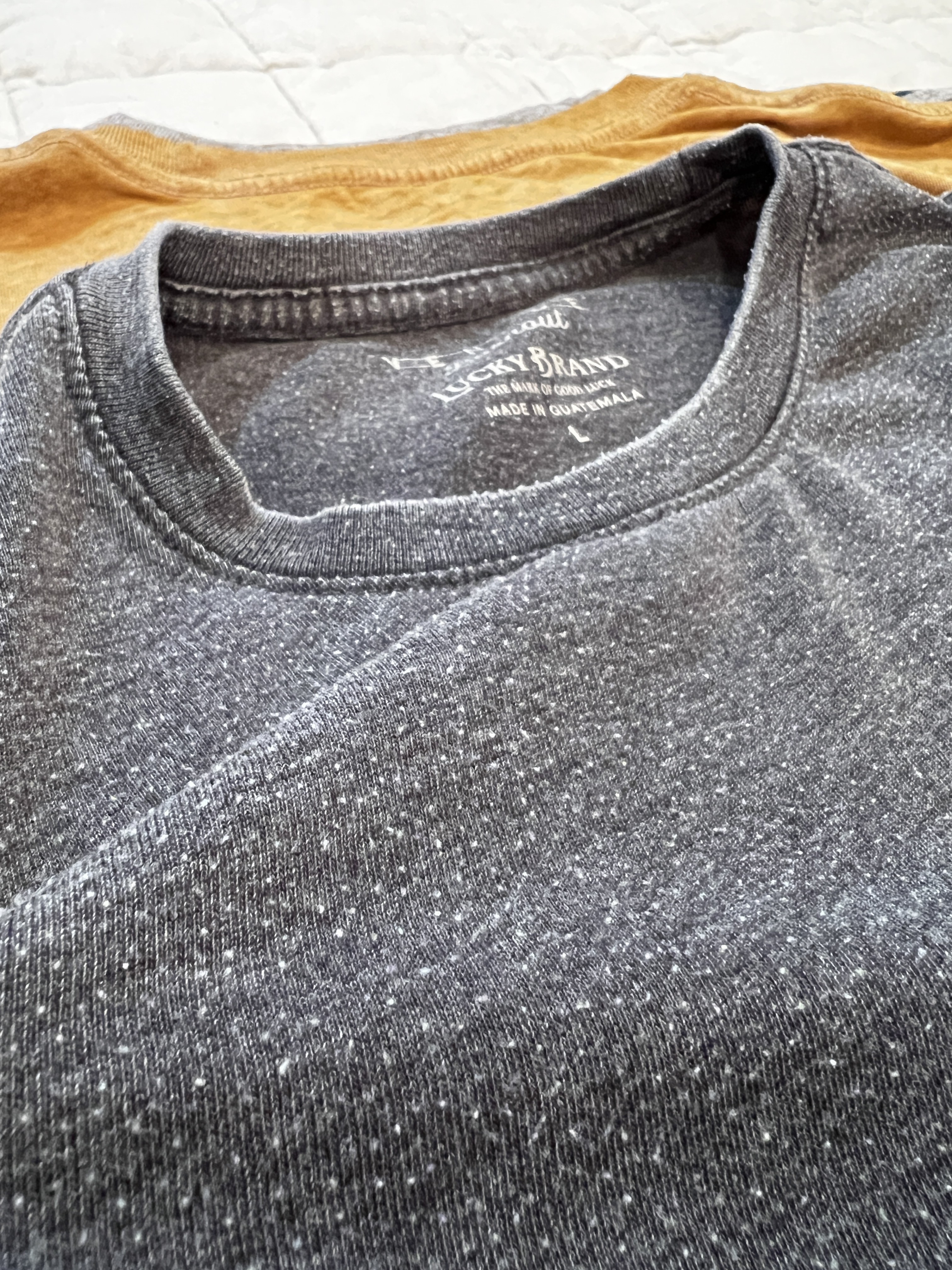 Look closely at how pilled the fabric is. No other brand shirt feels this low quality.