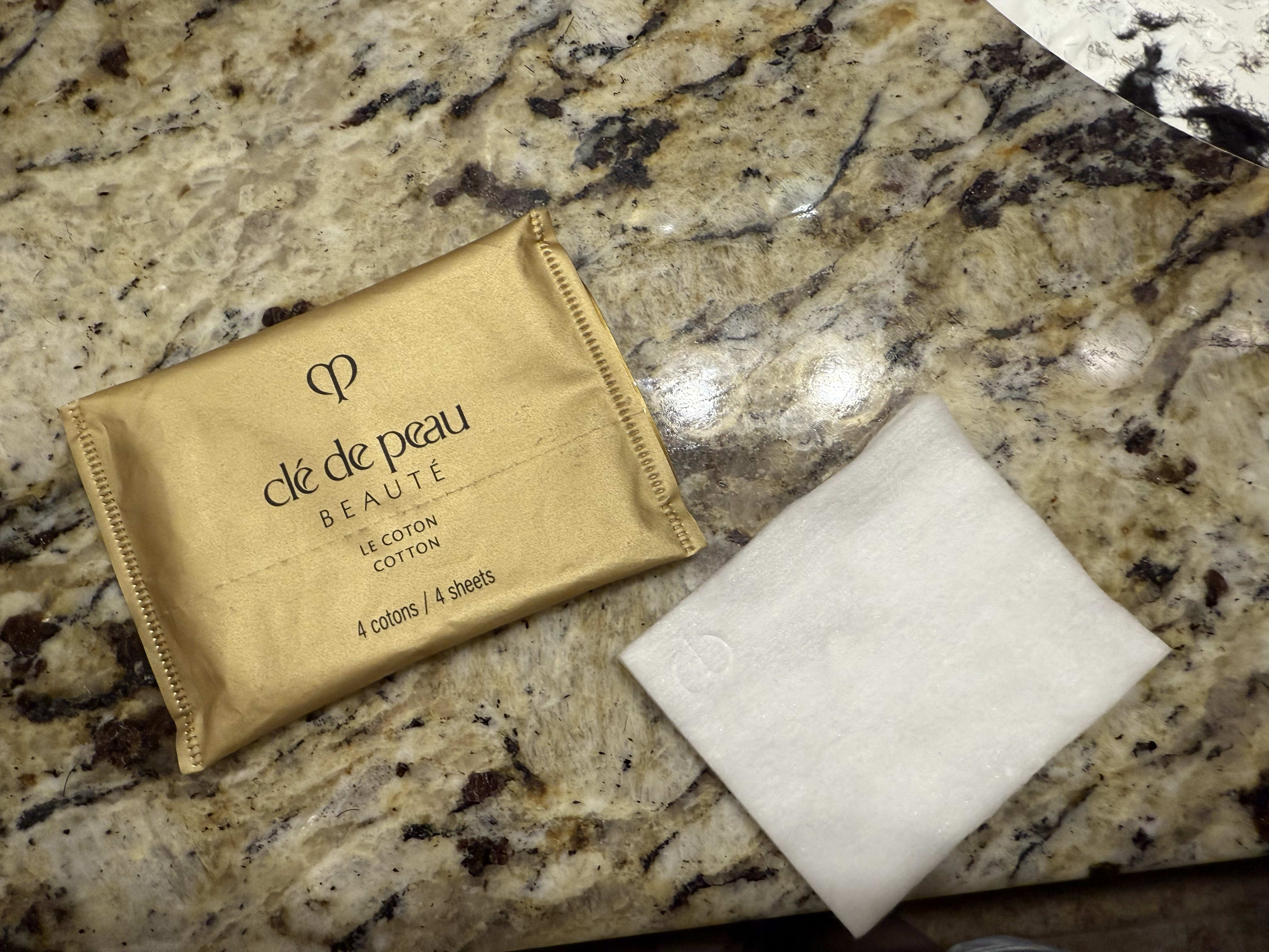 "Received these Clé de Peau cotton facial pads to try — they held my essence perfectly and left my skin hydrated and glowy!"