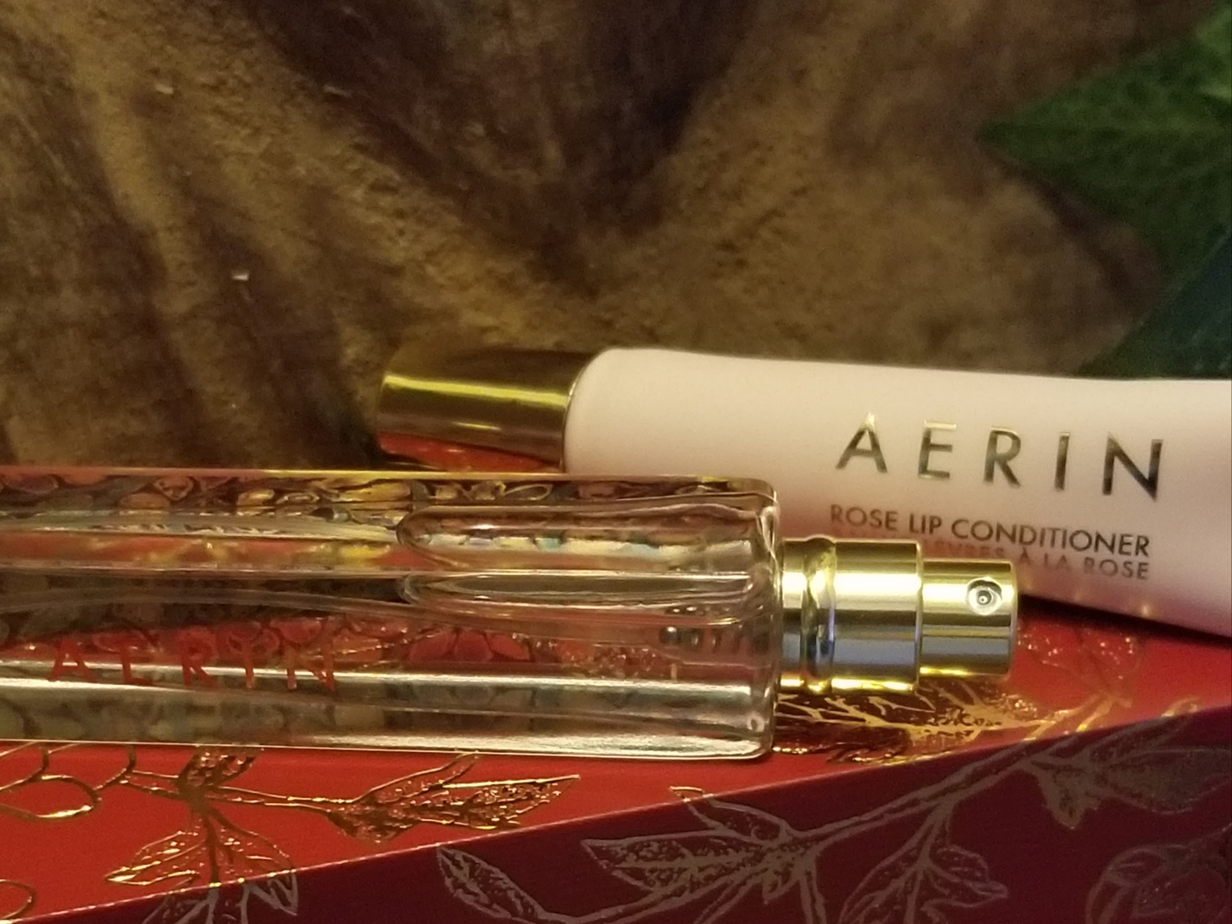 Aerin Mediterranean Honeysuckle travel perfume + rose lip conditioner