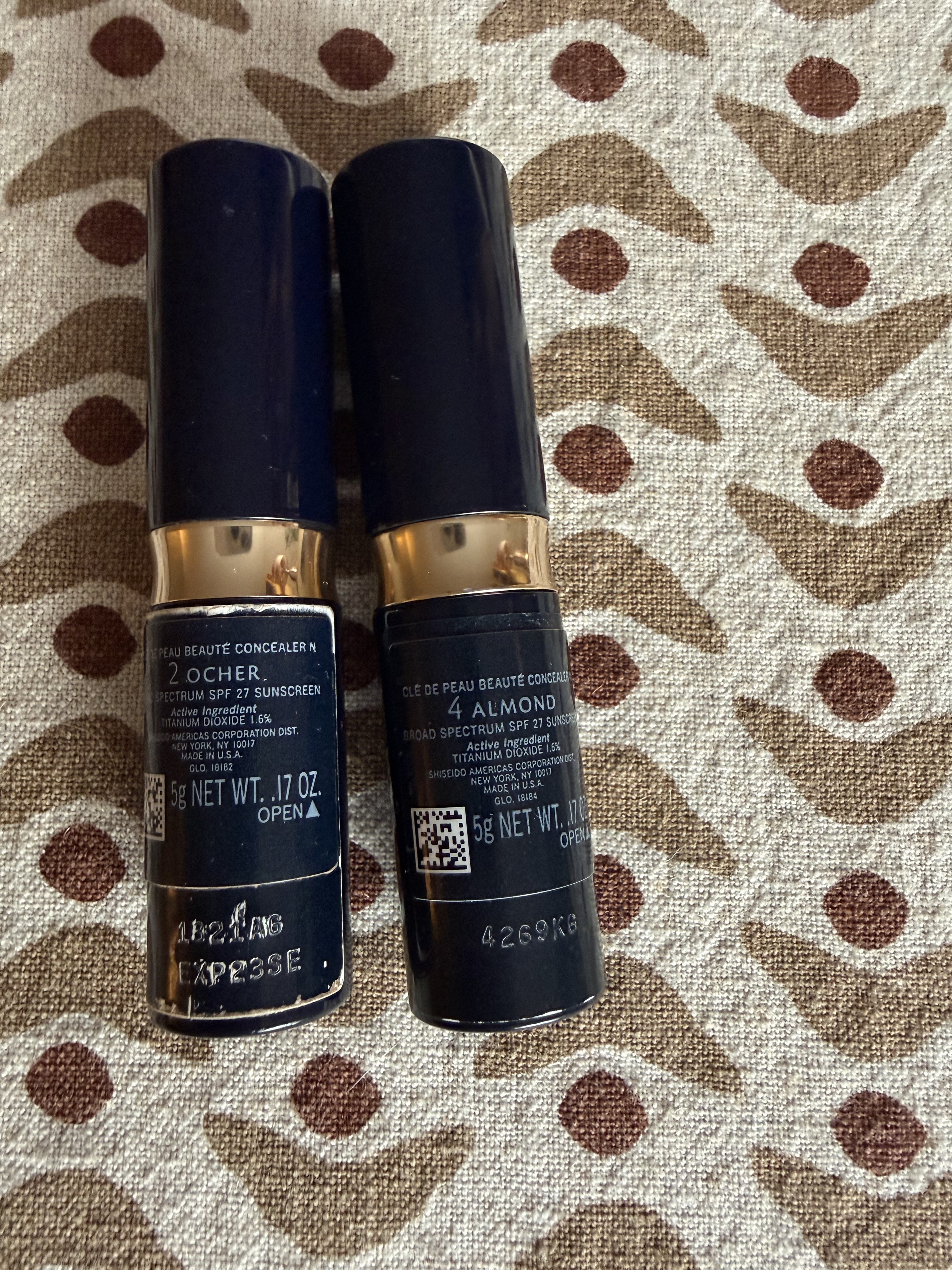 Older ocher on left, new almond on right