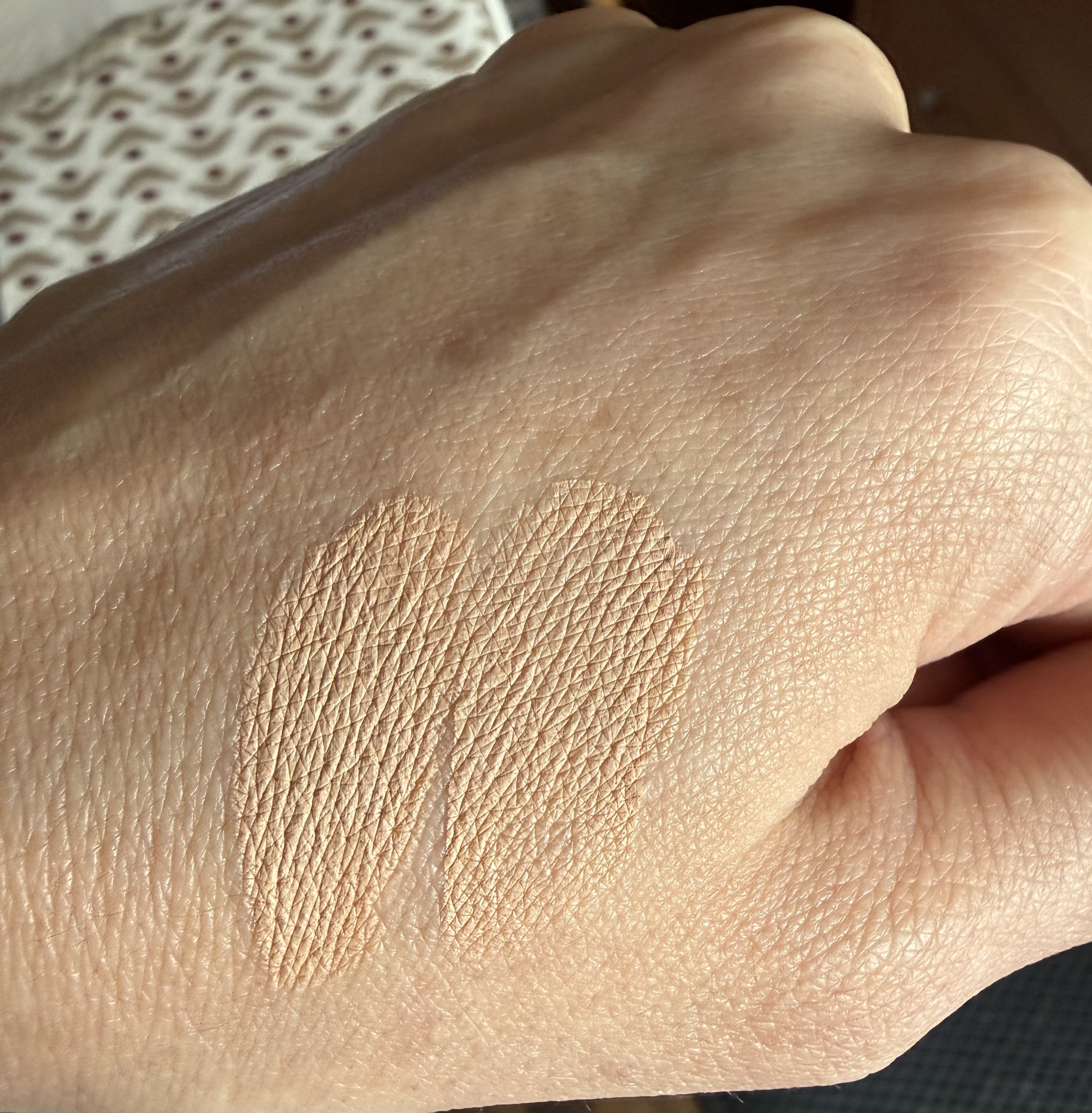 Ocher on left, almond on right. On the face looks the same.