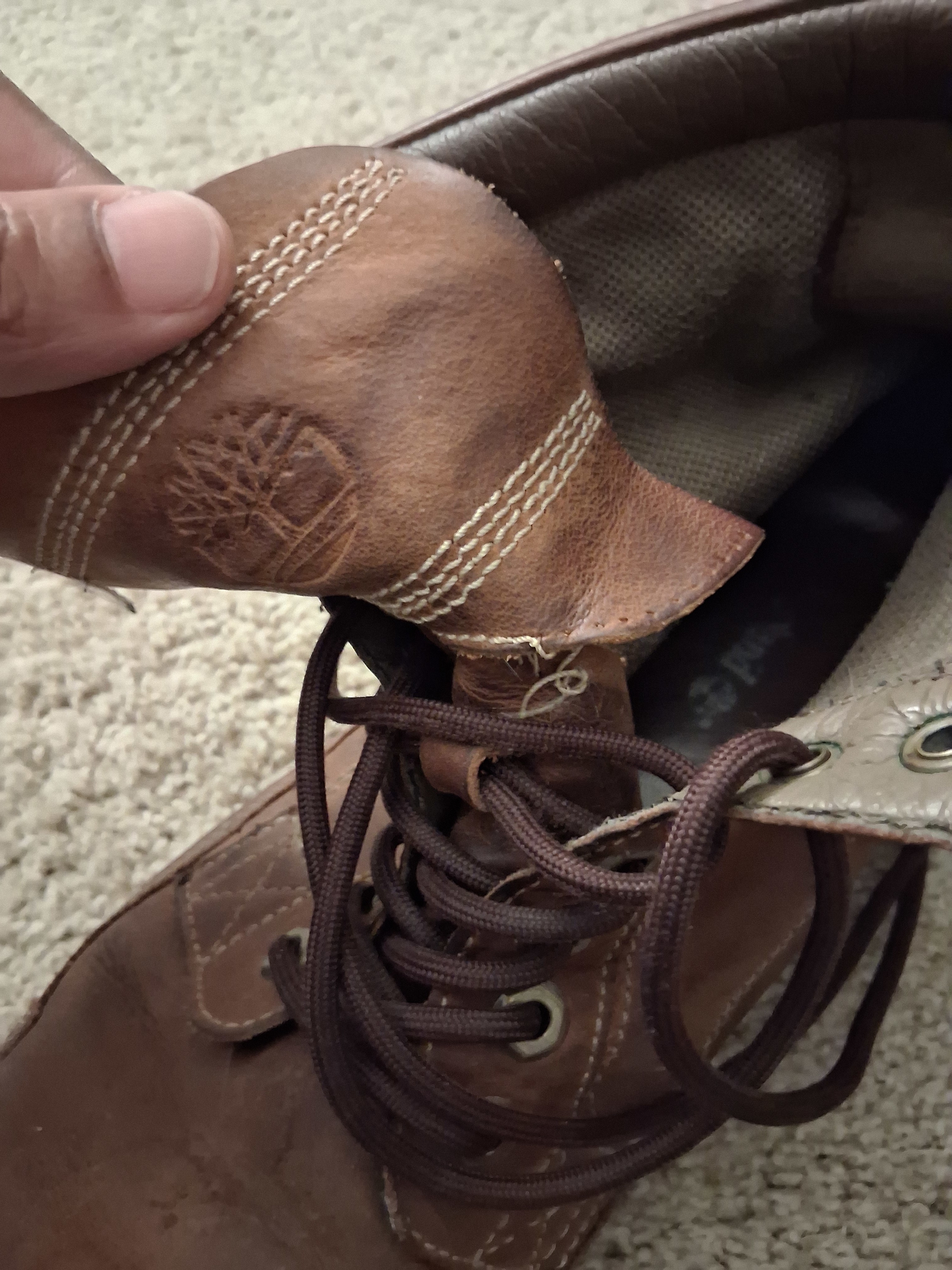 Stitching on tongue