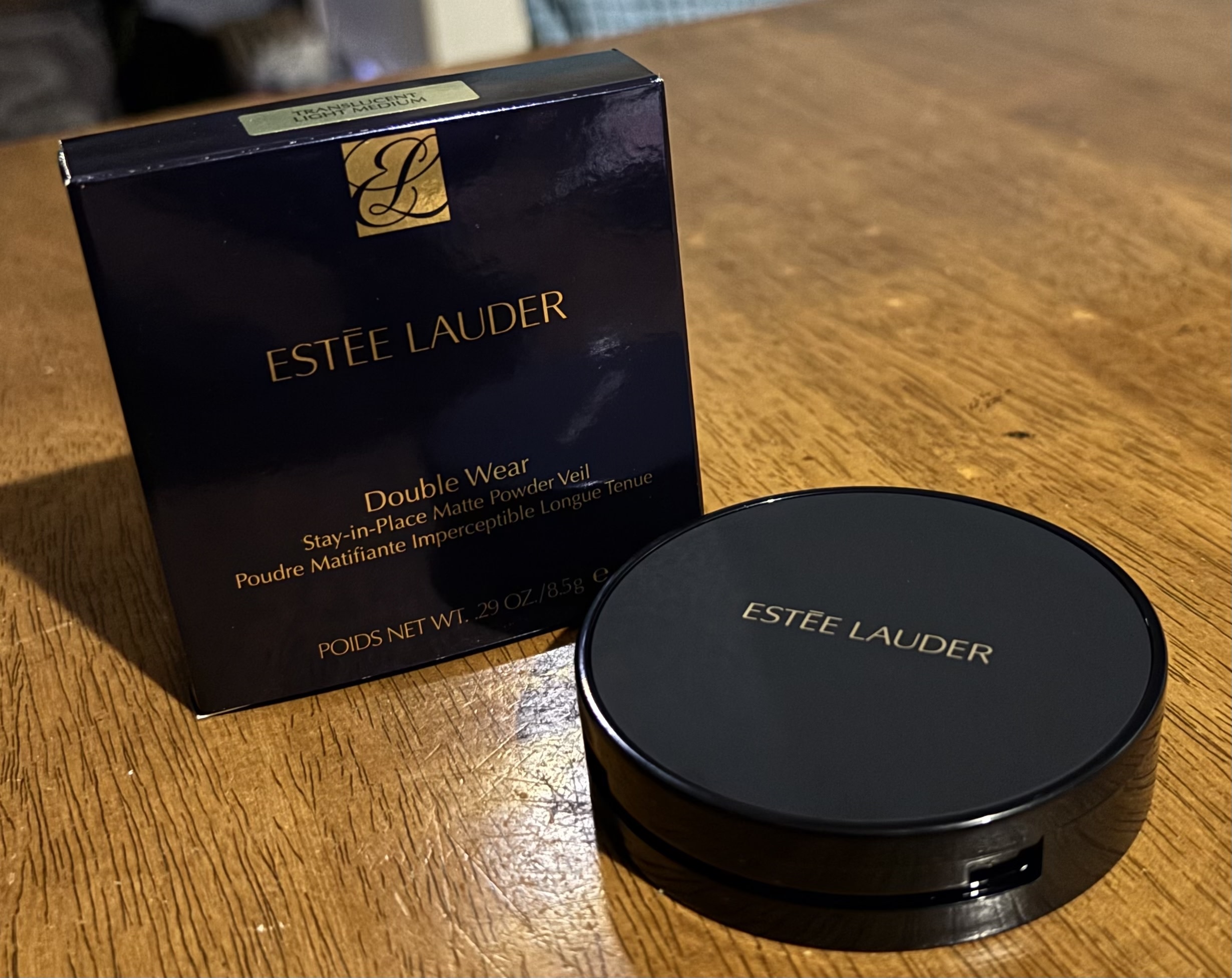 Box and closed compact of the Estee Lauder Double Wear Stay-in-Place Matte Setting Powder Veil.