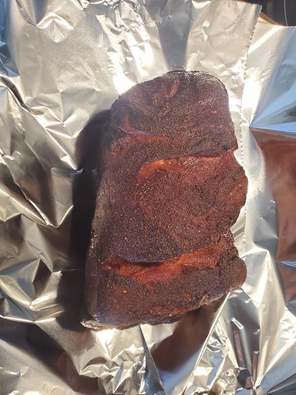 Pork shoulder before being wrapped