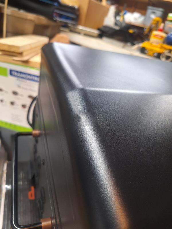 Can just see the small dent here. But not really the big one.