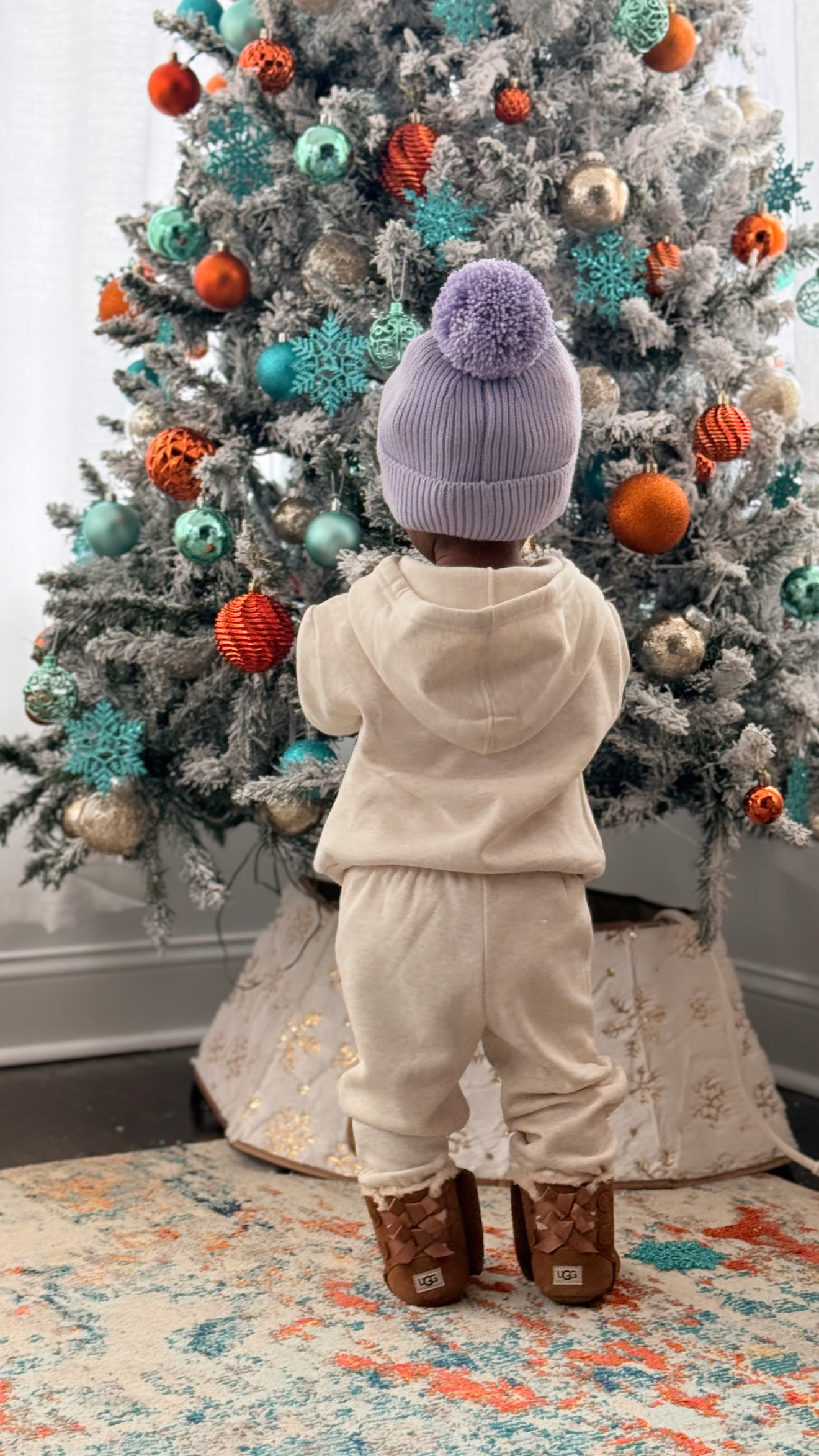 My granddaughter Saint wearing her UGG Bailey Bow