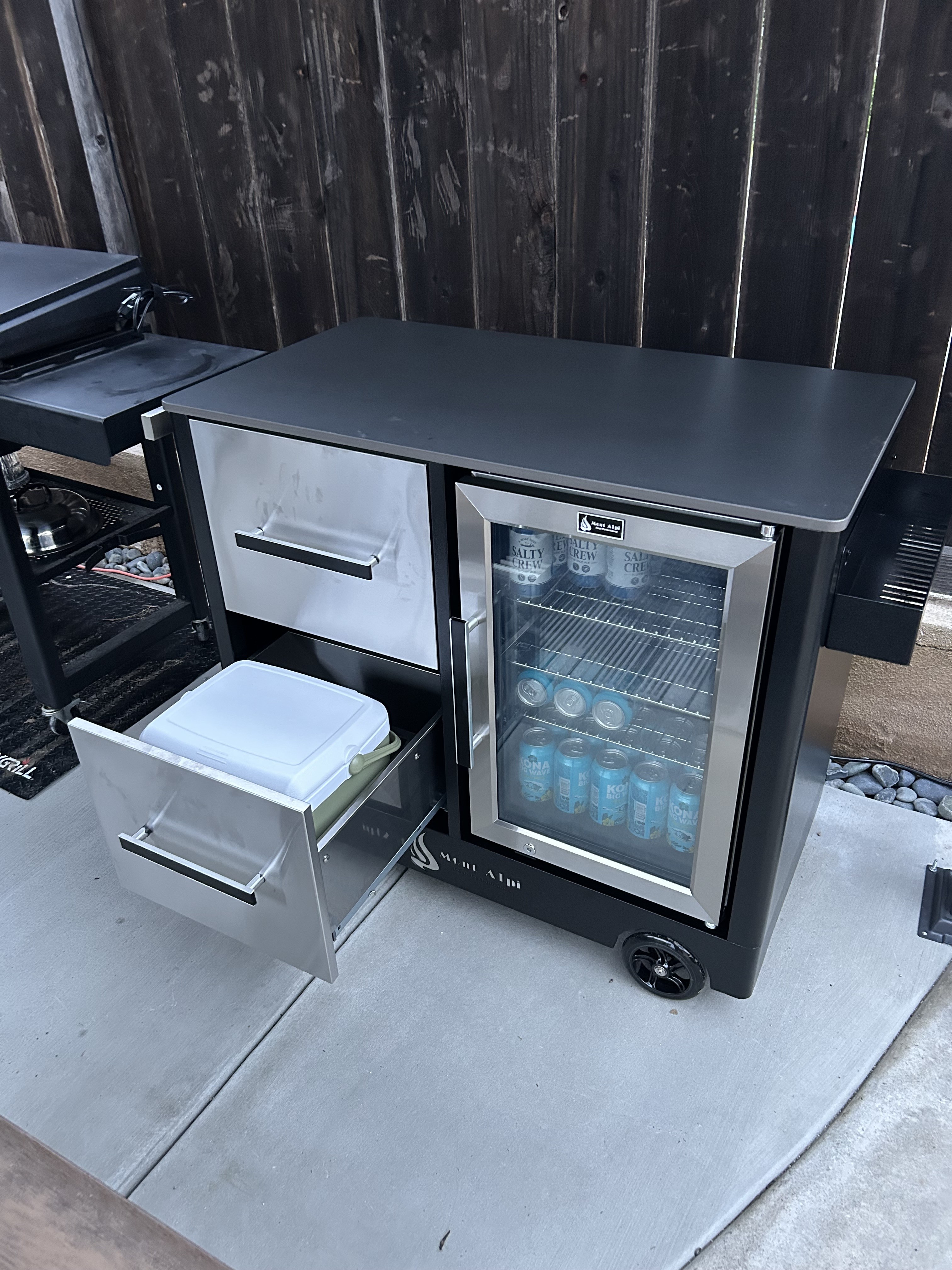 Storage drawer with cooler for ice.  Or remove the included cooler and use it for more storage.