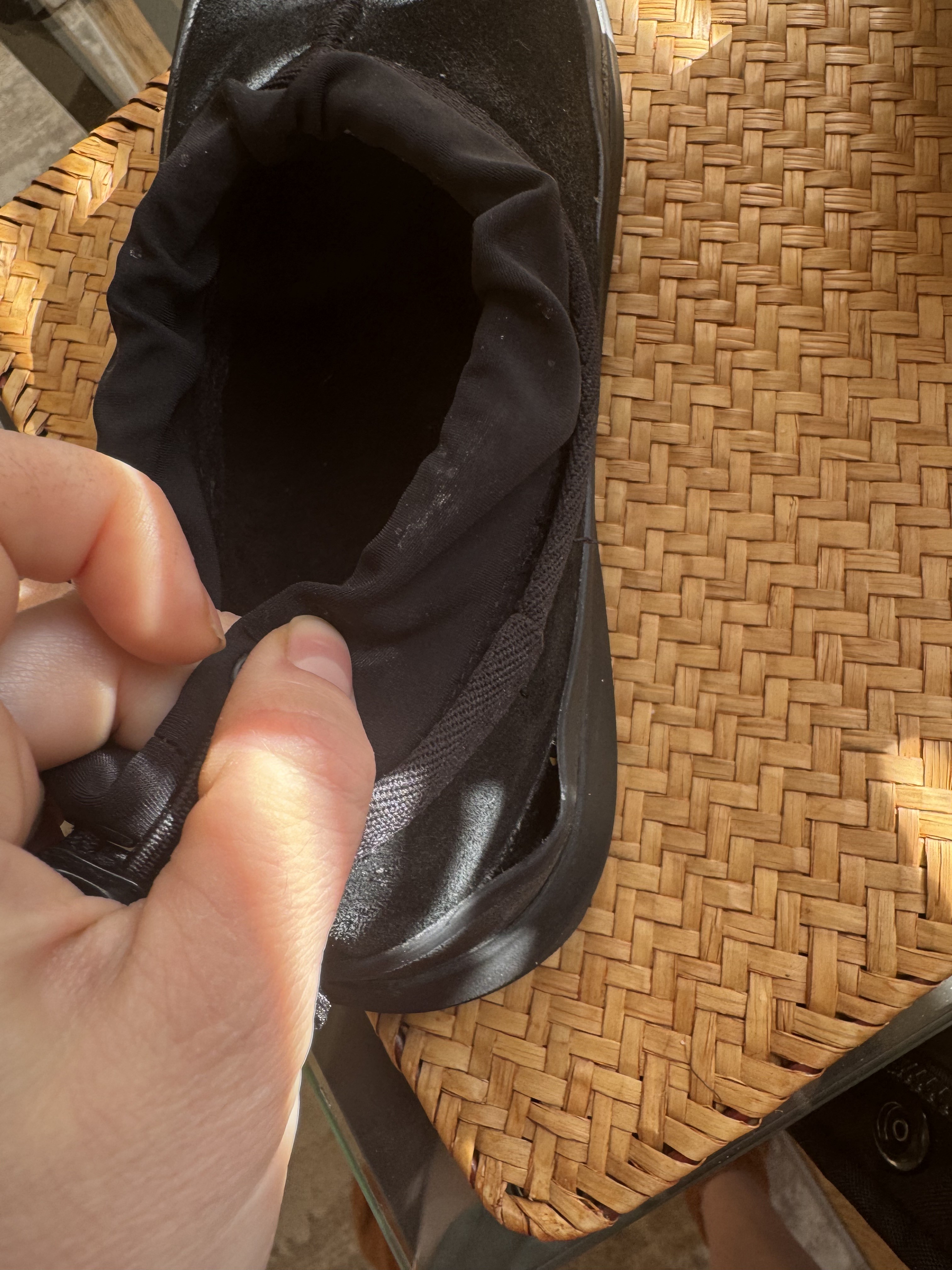 The sole of the left boot has come unglued.