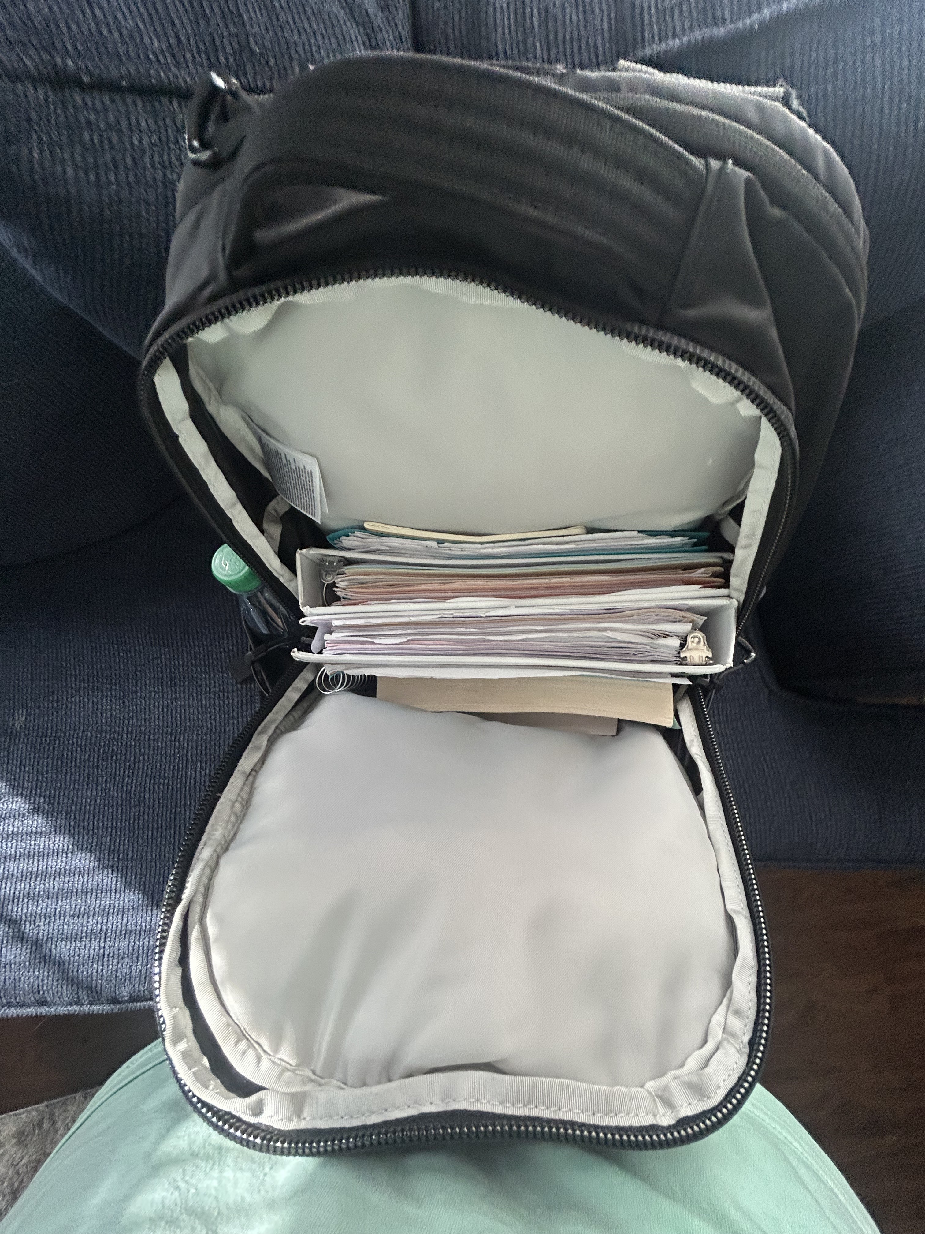 Biggest pocket, fits all the rest of my supplies, can't see from this angle but in the front i have a pencil case another notebook, and two books.