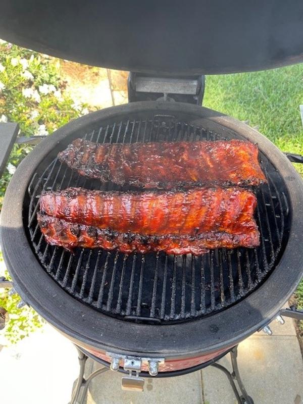 Slow smoked Baby Back and St Louis Ribs about to go in the foil.