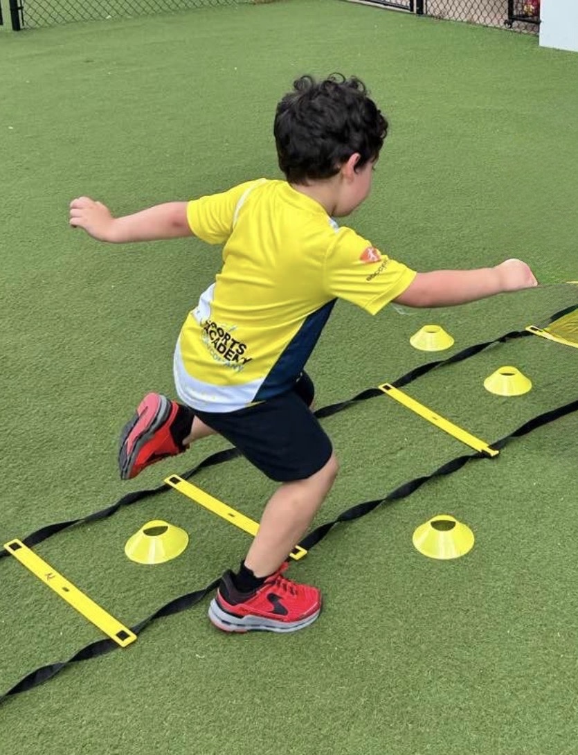 He goes everywhere with his favorite sneakers. Even to play sports