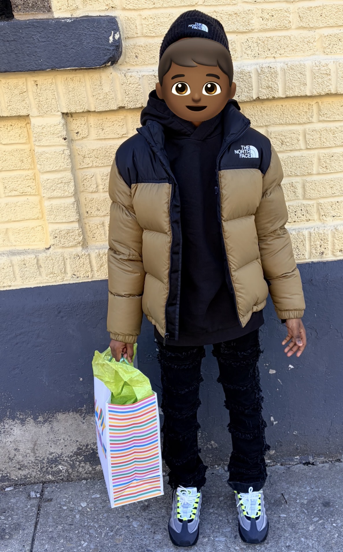 My son in the NorthFace jacket and hat.