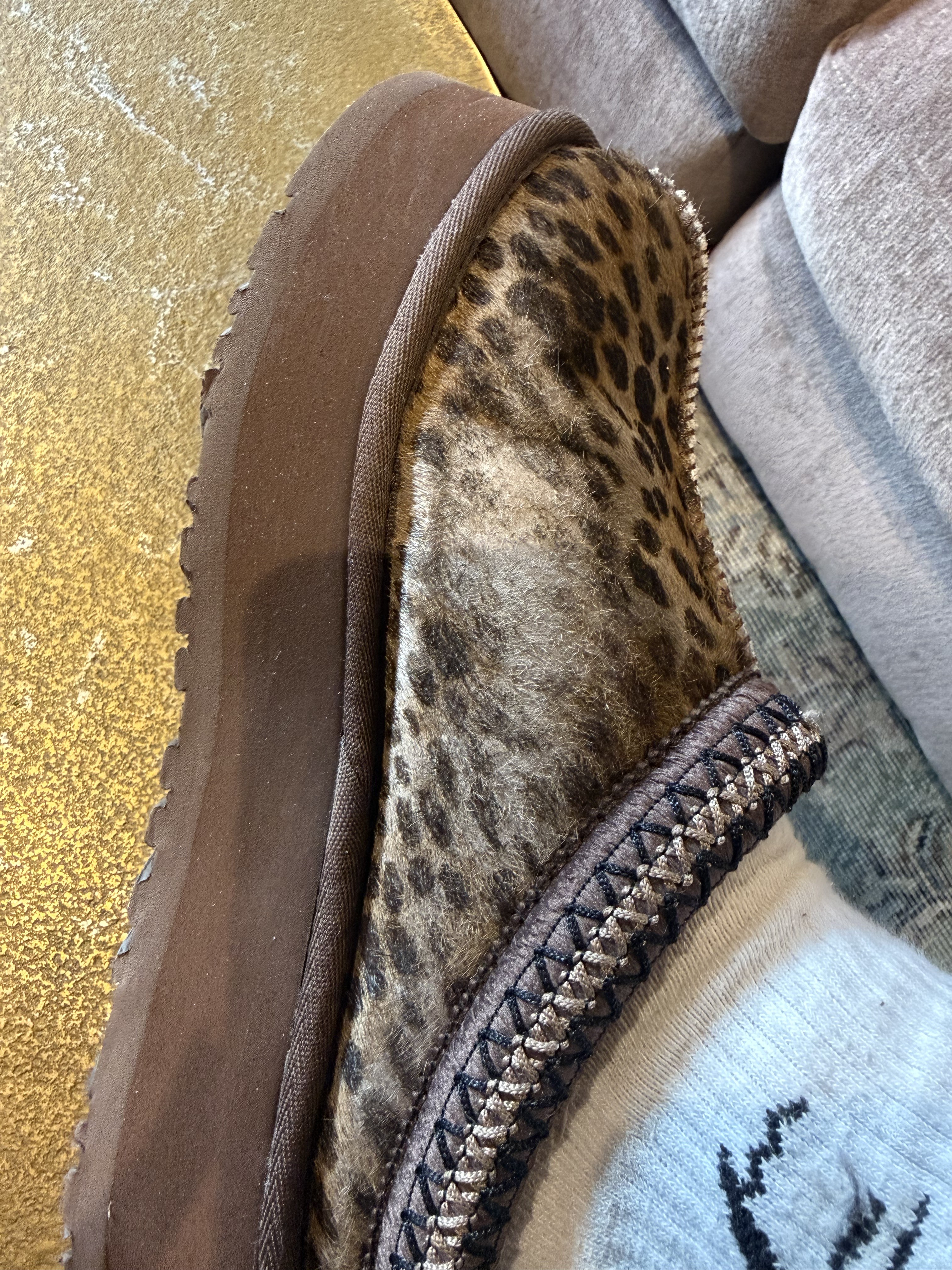 Side view, she's bald.