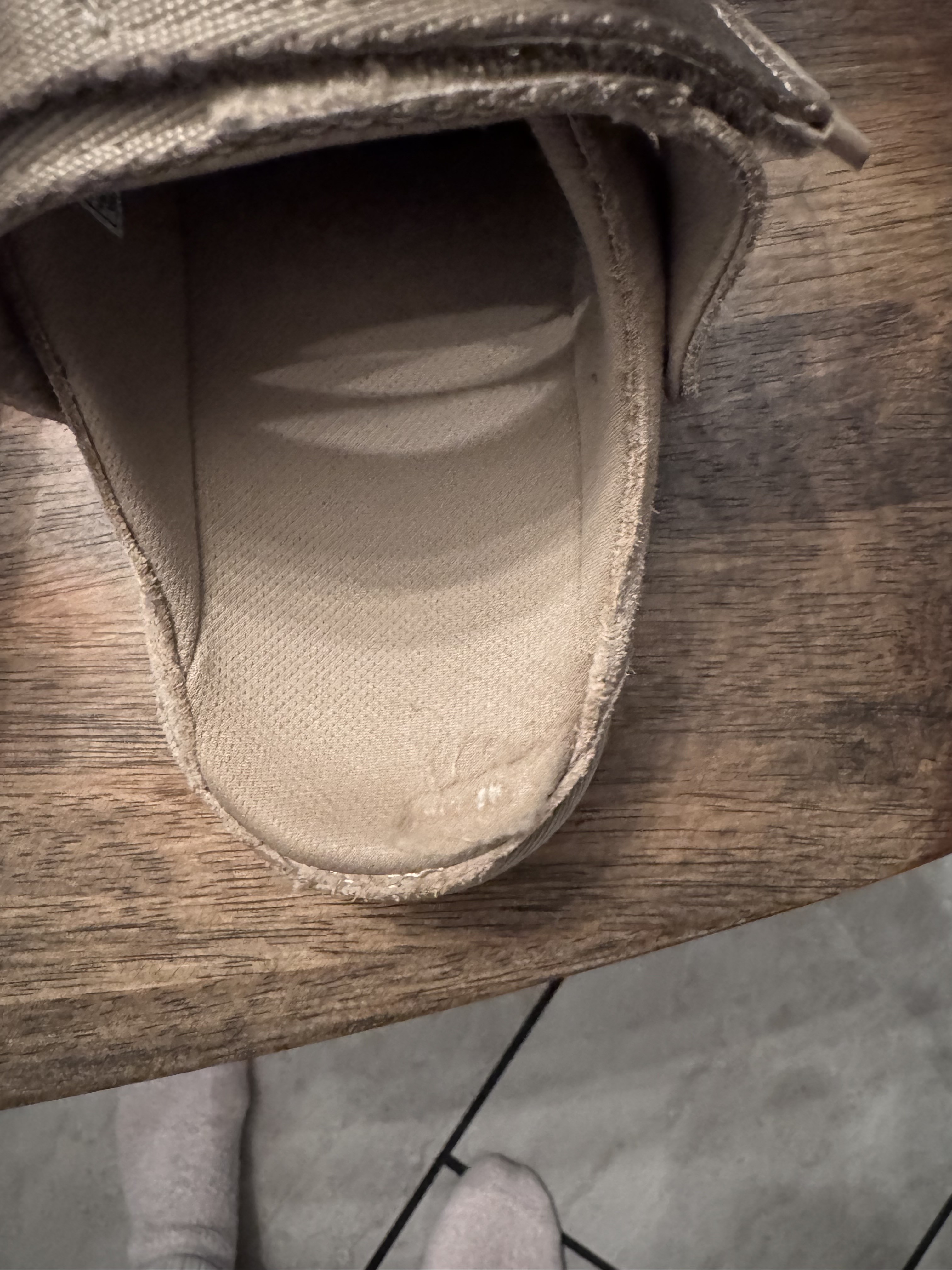 Hole in right heel