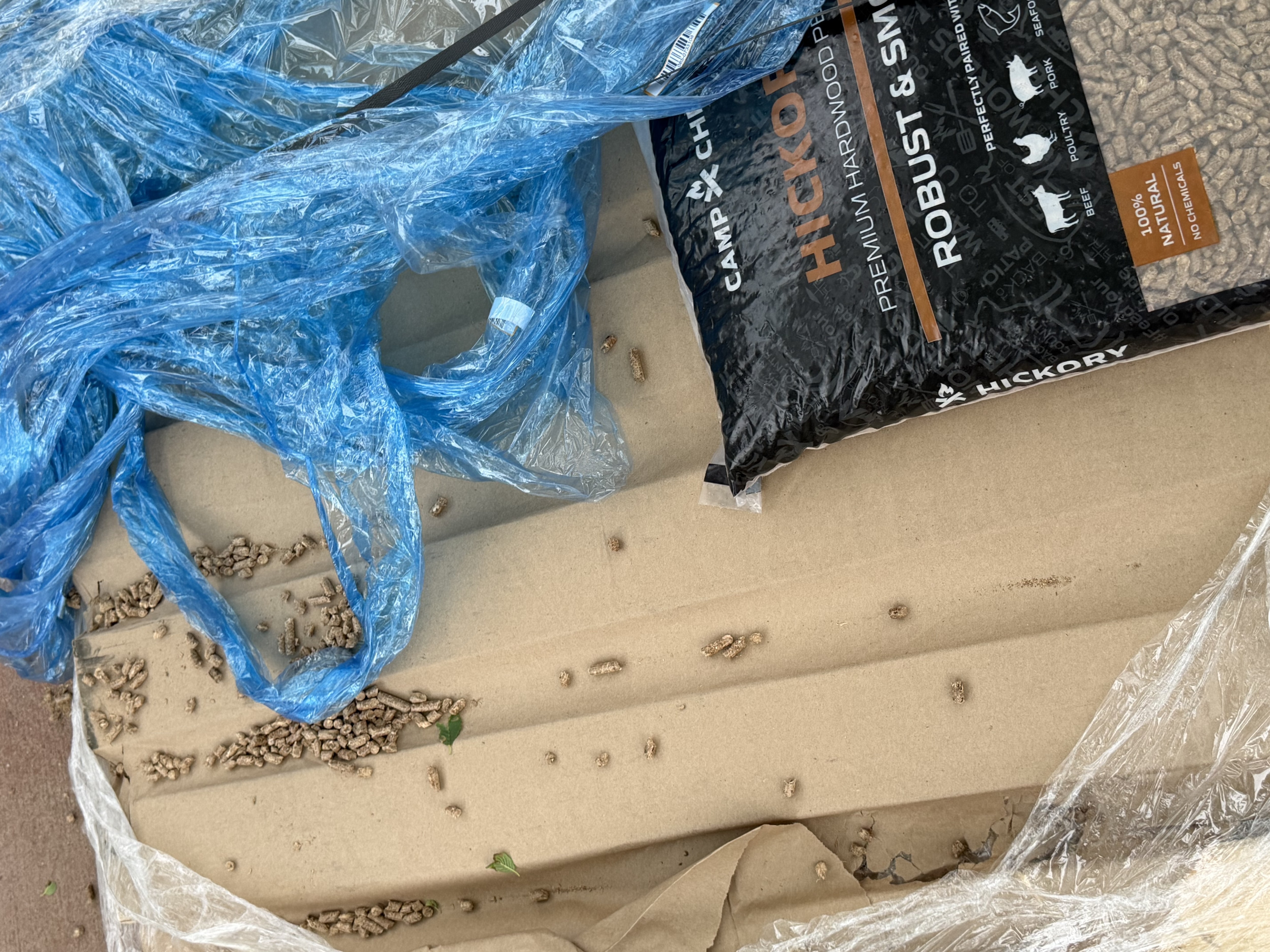 Pellets from torn bag.