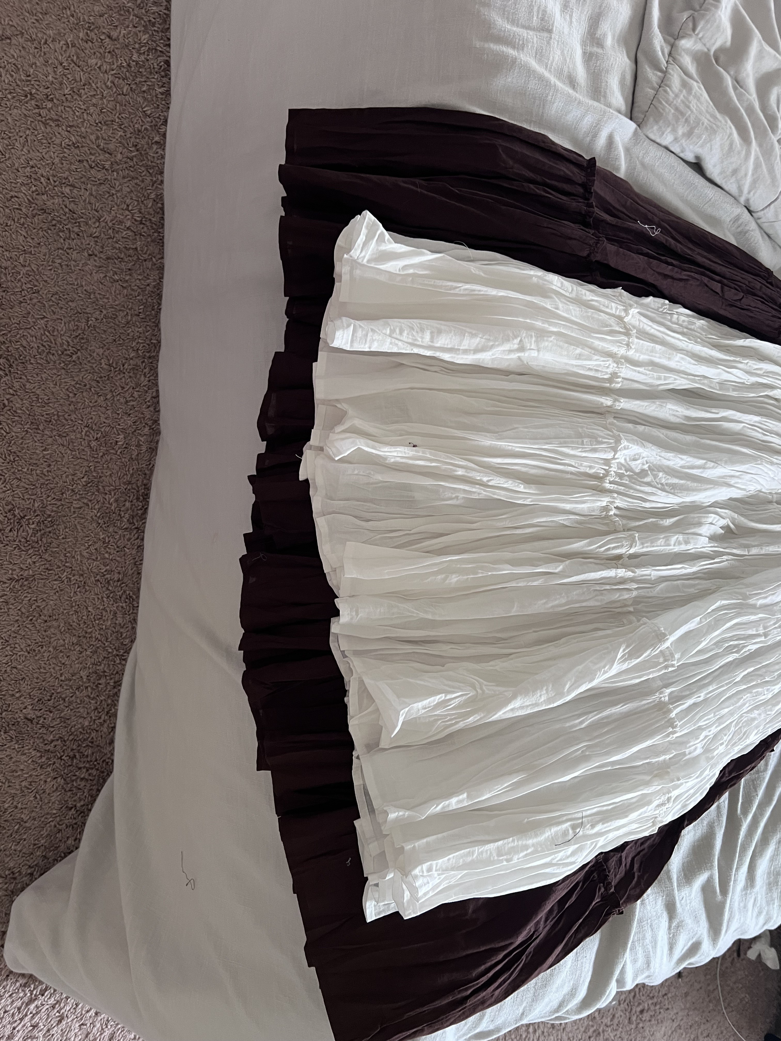Both are labeled on the price tag and internal label as large