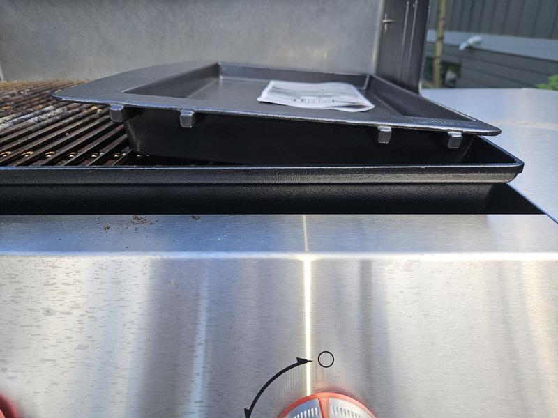 The Griddle is apprx 1/2" too wide. The grate needs to be cut to fit OR the mold is off. Customer service is a 1. No response and waiting on a phone for over 60mins and still no follow up