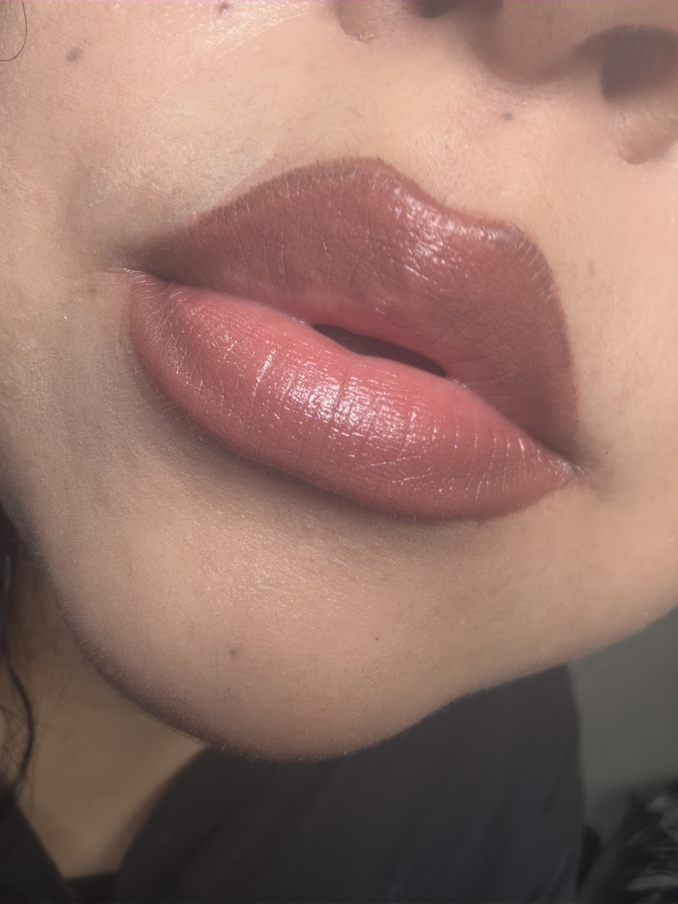 With a brown lipliner and the oh it's Mac on the center
