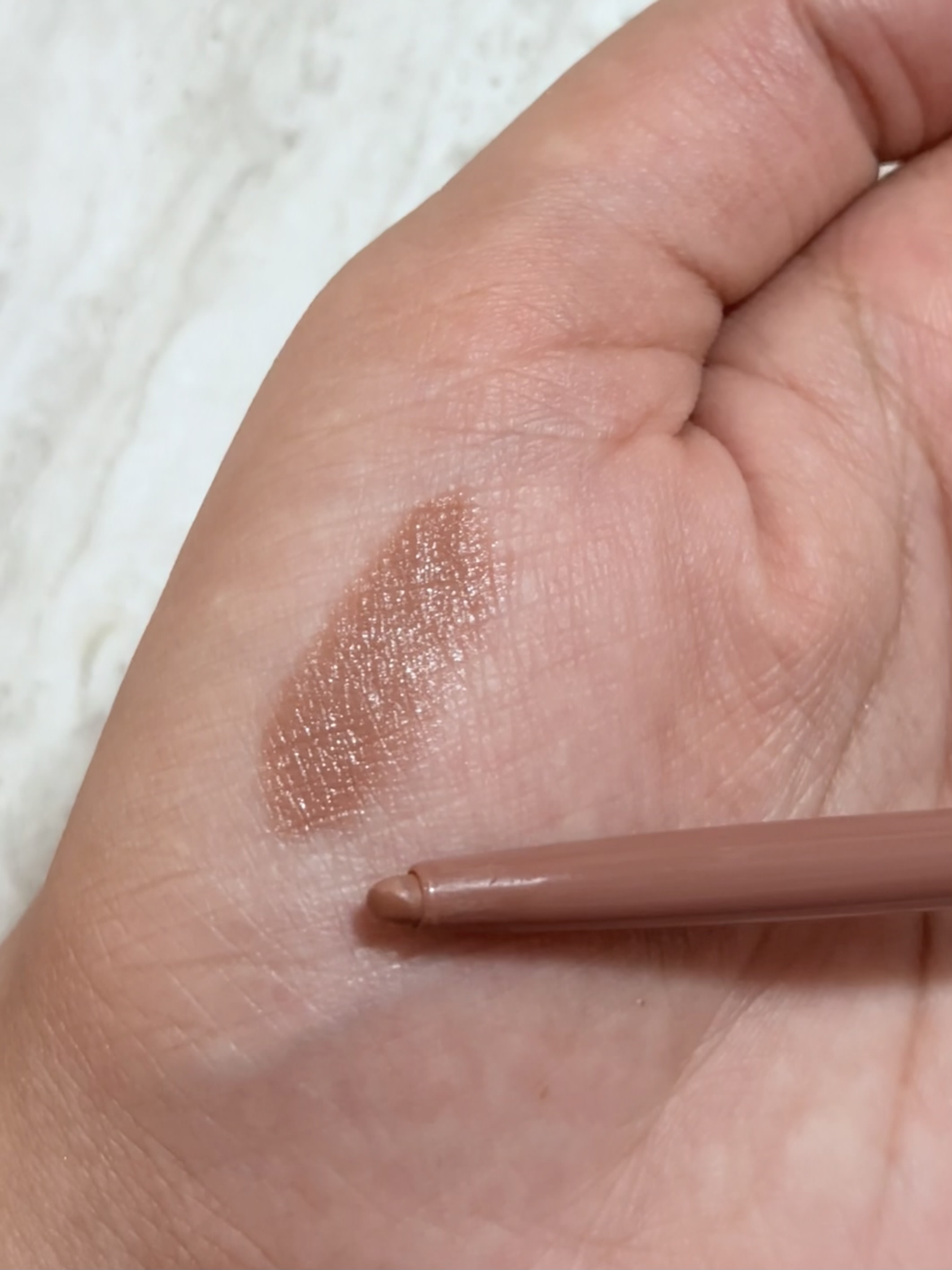 Glides very well great formula, shade is light on me.