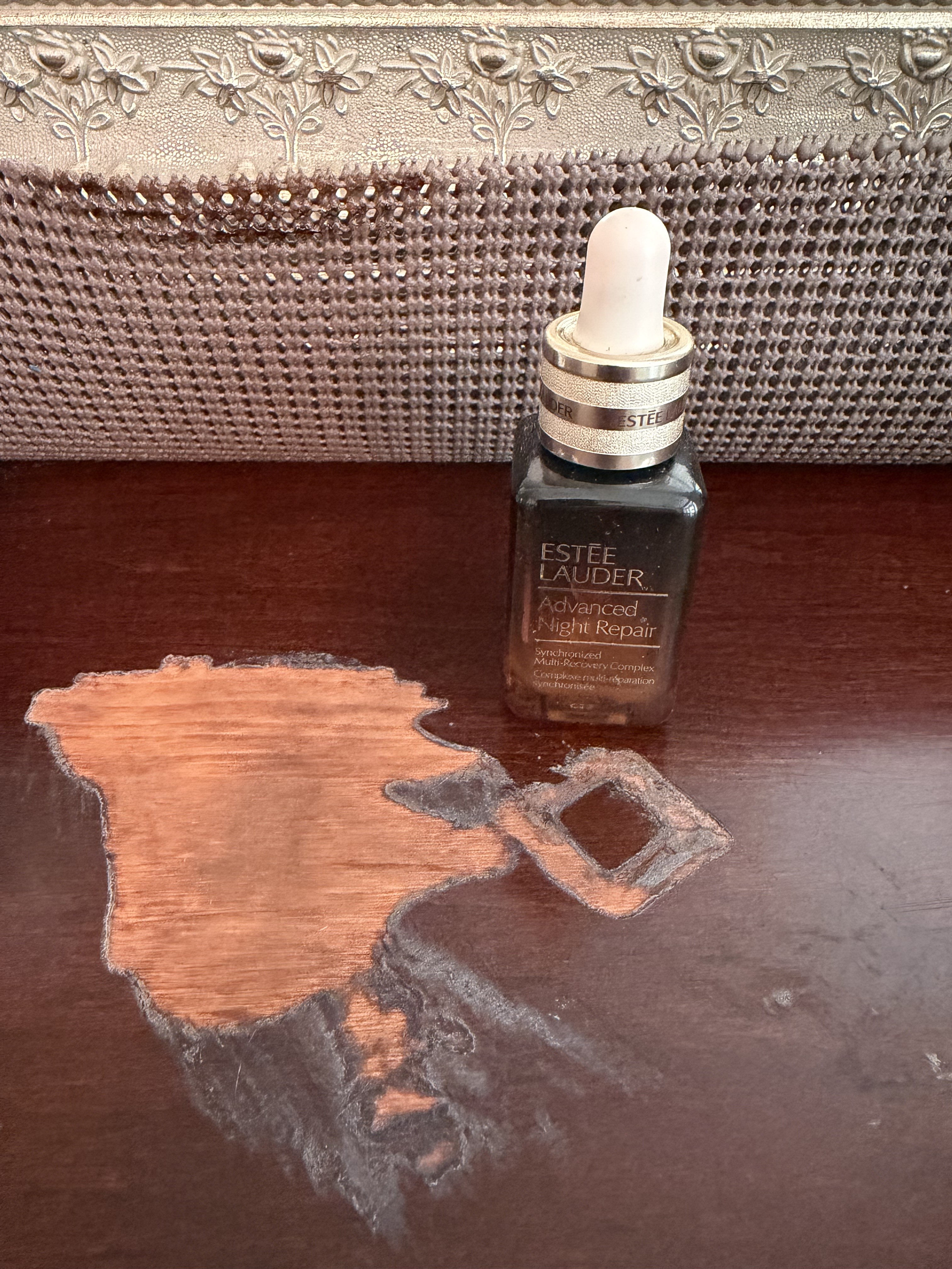 What chemical in the product eroded the wooden surface