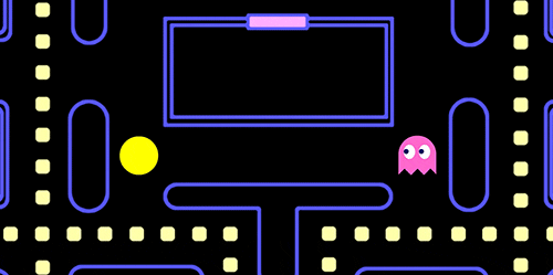 A gif of Pacman heading in the direction of a pink ghost.