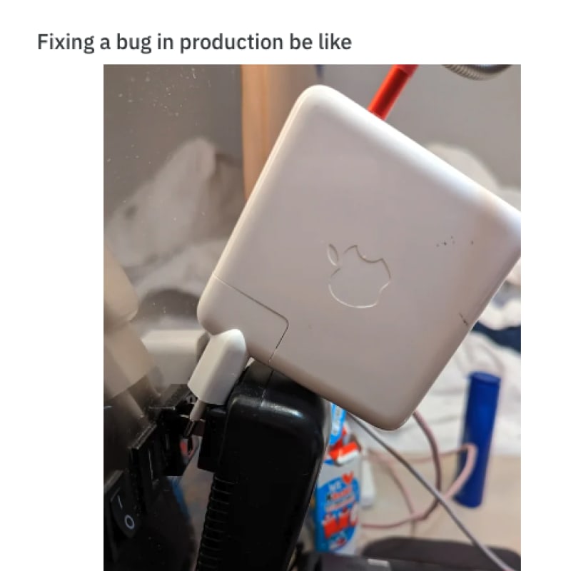 Fixing a bug in production be like: Image of shoving two chords into the same plug.