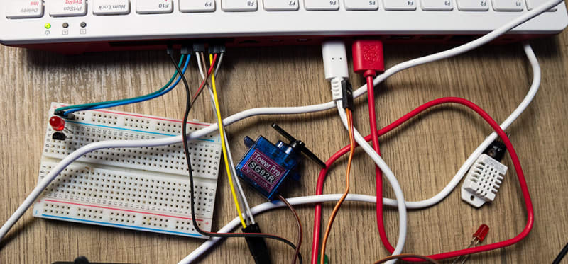 Raspberry Pi 400 with several devices connected to GPIO header