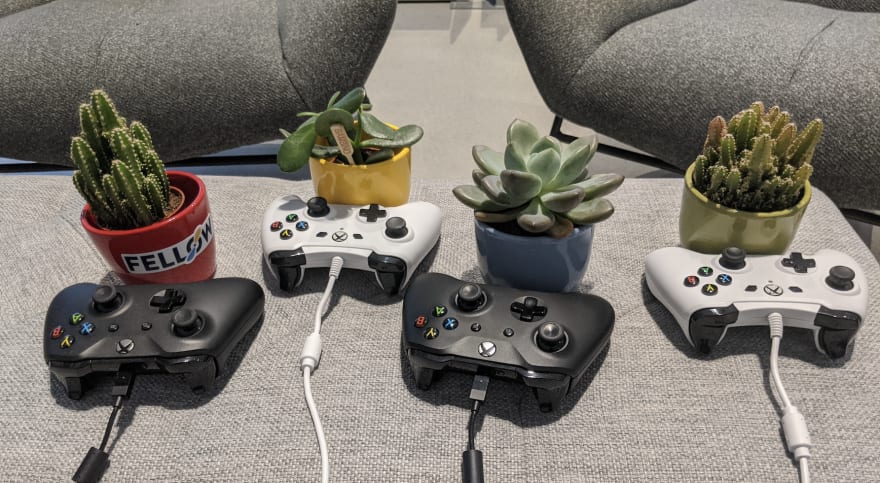 Four succulents with Xbox controllers