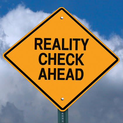 Warning sign -Reality check ahead