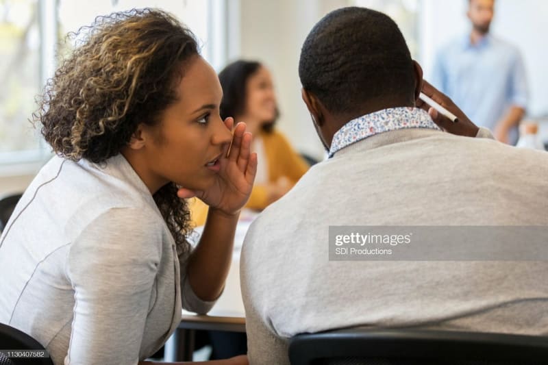 Two people ensuring secure communication in the presence of adversaries