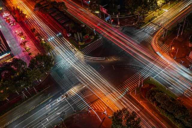 Overhead time lapse image of intersection at night