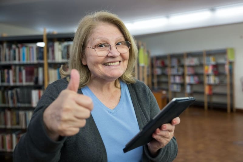 Photo by Kampus Production: [https://www.pexels.com/photo/a-woman-in-blue-shirt-holding-black-tablet-7983627/](https://www.pexels.com/photo/a-woman-in-blue-shirt-holding-black-tablet-7983627/)