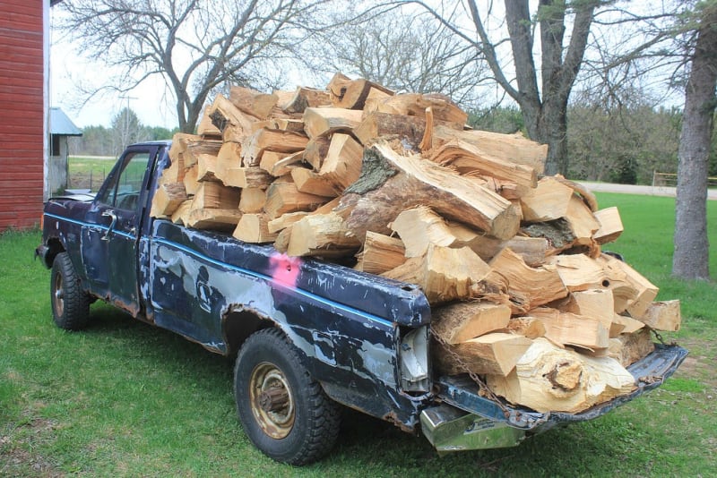 Image of pickup truck full of logs