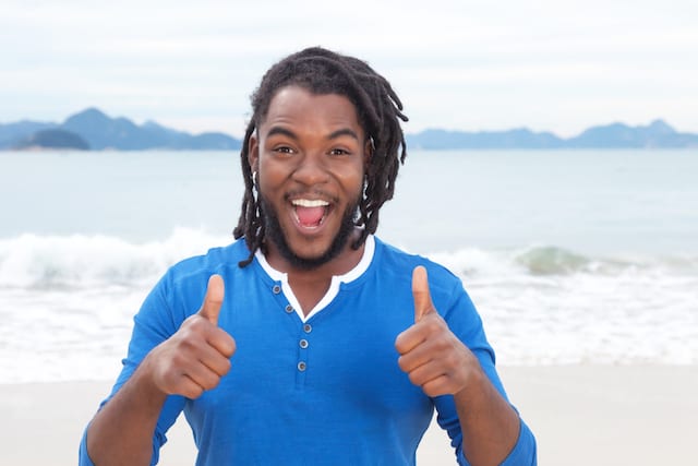 happy black guy with dreads