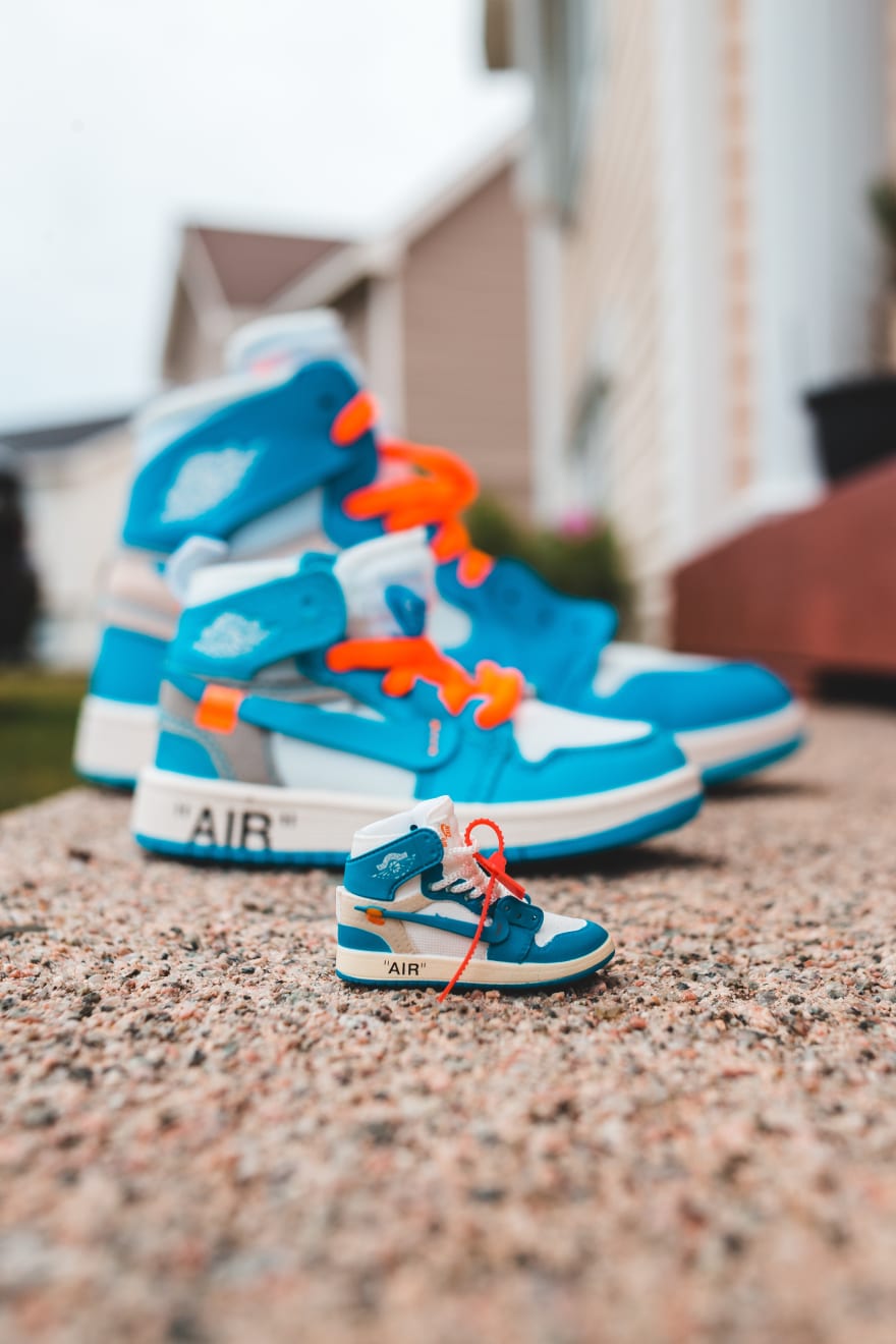 One big pair and one baby pair of shoes