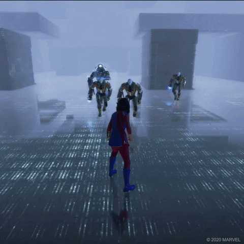 Kamala in her Marvel costume is punching cyborgs