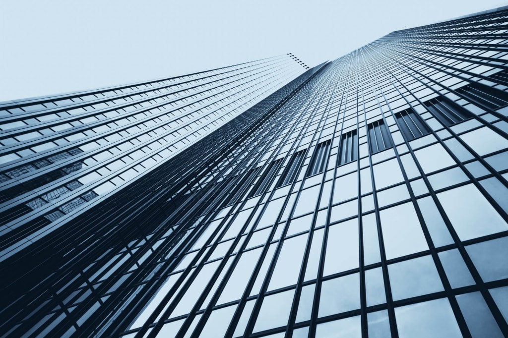 Freelance Website Developer in Mumbai 8 office buildings. Modern glass silhouettes on modern building.