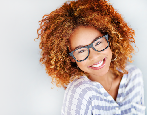 smiling woman wearing glasses