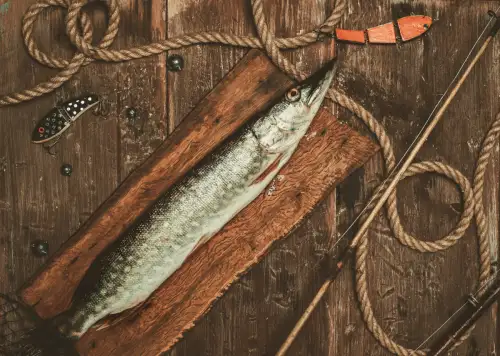 A photo of a pike on top of a cutting board