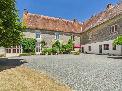 Renovated 7 bedroom manor house with equestrian facilities for sale with countryside views in Saint Hilaire des Loges, Pays de la Loire