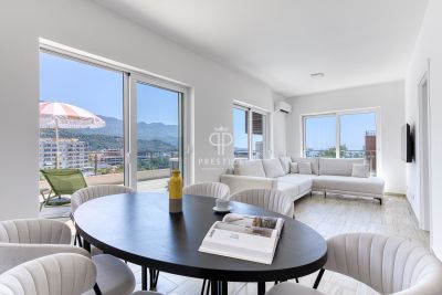 Stylish 2 bedroom Apartment for sale with panoramic and sea views in Becici, Coastal Montenegro