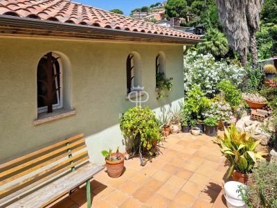 Authentic 2 bedroom Chalet for sale with panoramic and sea views in Lloret de Mar, Catalonia